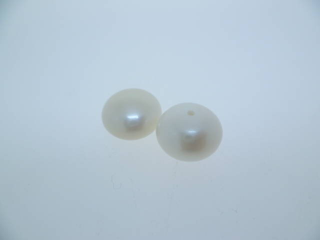 Finding button pearl half drilled