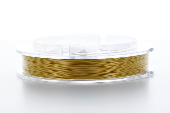 [16090FT060A05] Alambre de acero japones 7 hebras revestido nylon 100 mt 0.60mm (Oro)