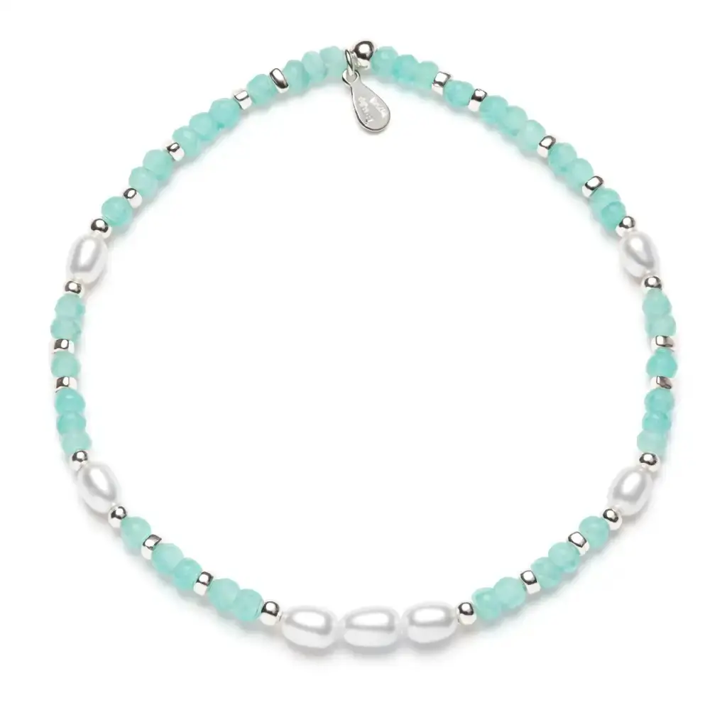 Sterling silver elastic bracelet with 4 mm semiprecious stones interspersed with 4×5 mm pearls
