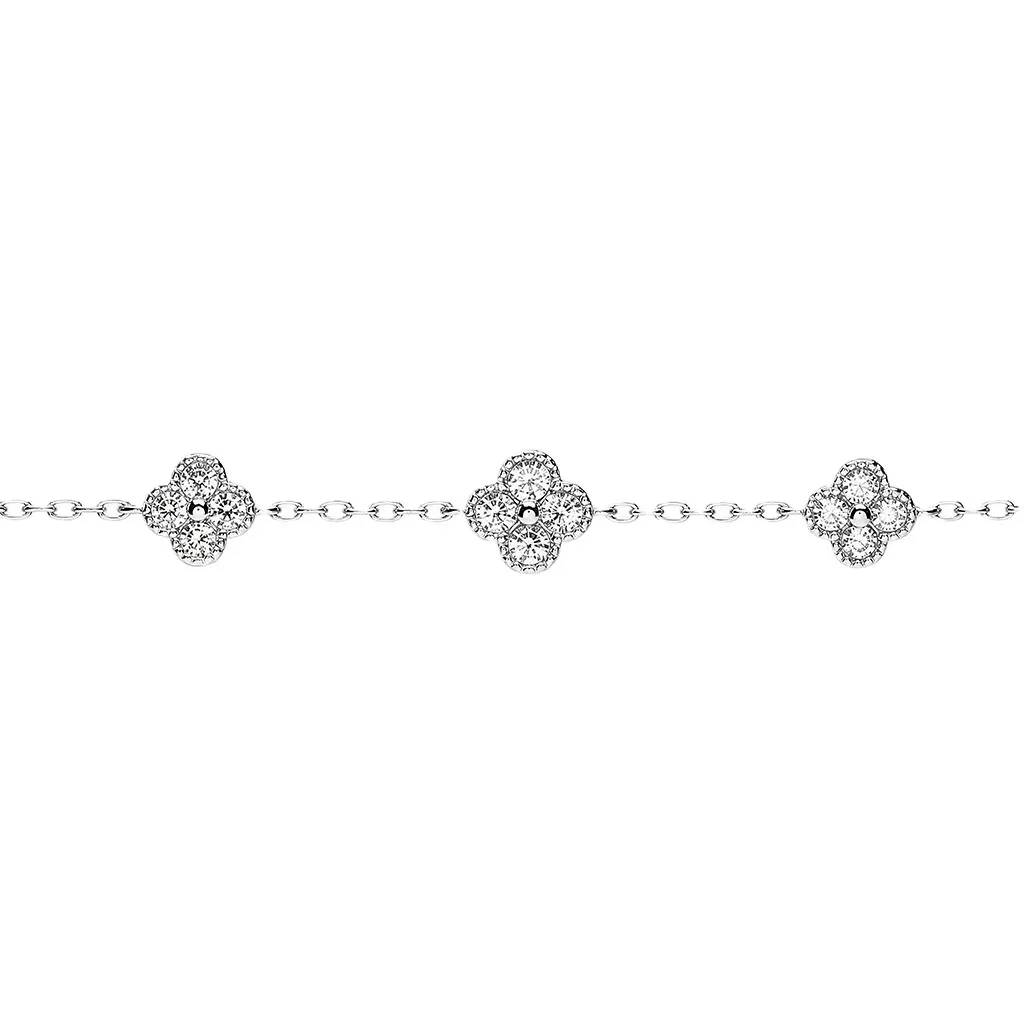Sterling silver bracelet with one 7mm flower and two 6mm flowers with cubic zirconias
